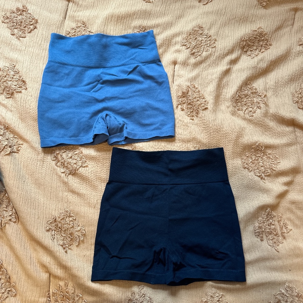 Blue and black high-waisted work out shorts with butt scrunch